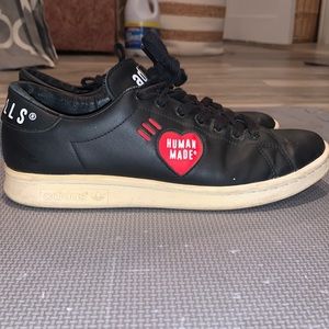 Adidas human made black leather shoes.